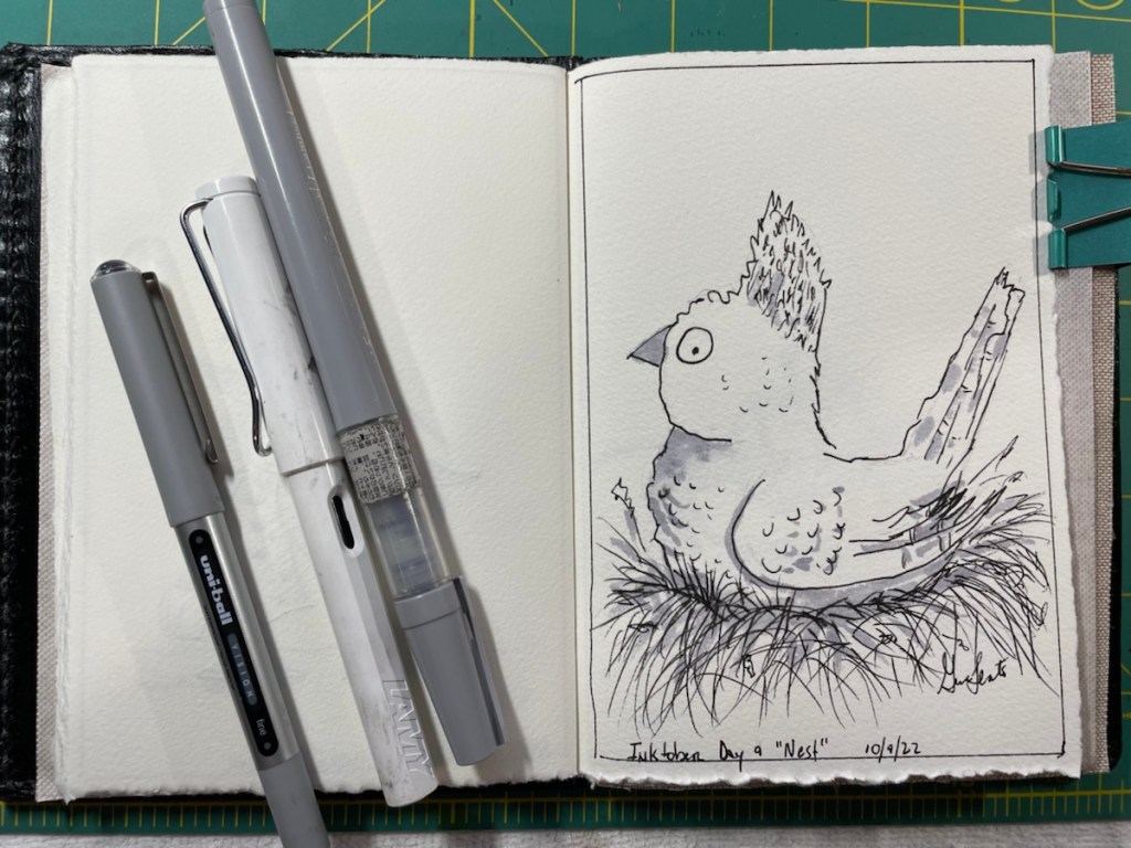 Inktober Day 9
Nest
Pen and ink drawing of a quirky bird sitting on a nest.  His expression looks like something may be occurring either on the nest or nearby. He has a fluffy crest and his tail is alert, similar to a Carolina Wren